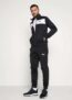 PUMA Survêtement Techstripe Tricot homme, Taille XS, Vêtements